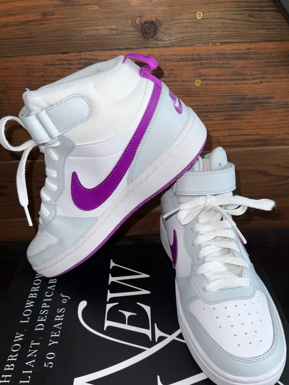 Nike White High-Top Sneakers with Purple Swoosh
